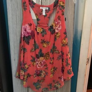 Lined racerback floral tank top.